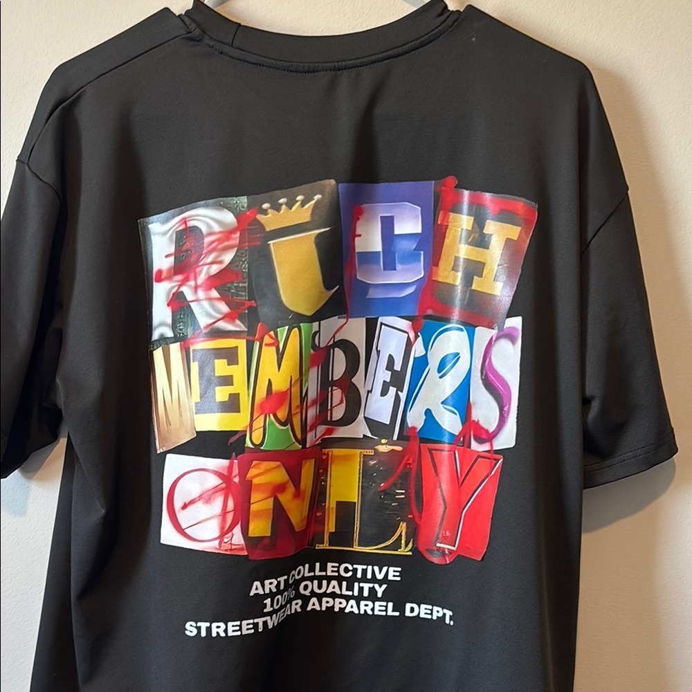 Graphic Black T-Shirt with Colorful Lettering